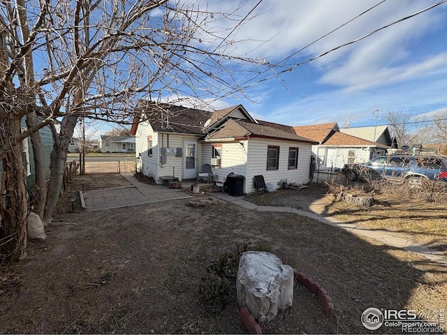 rear view of property featuring a patio area