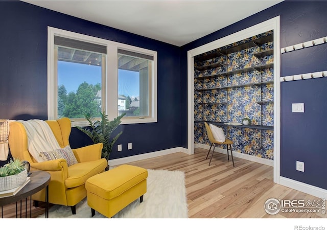 sitting room featuring hardwood / wood-style flooring