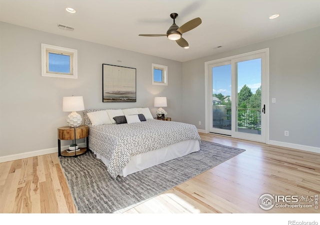 bedroom featuring access to outside, ceiling fan, and light hardwood / wood-style floors