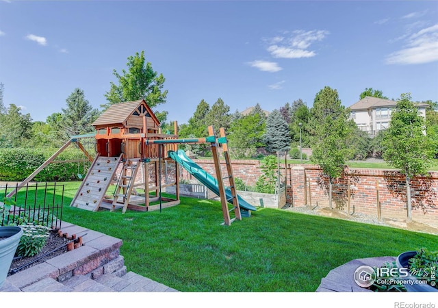 view of playground featuring a yard