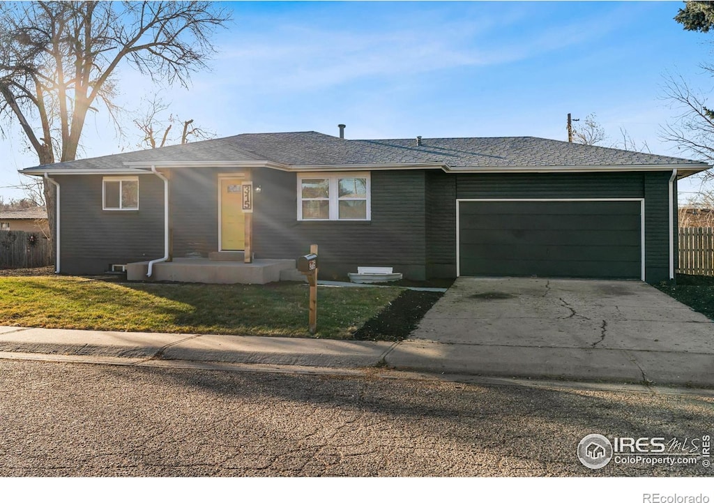 ranch-style home with a garage