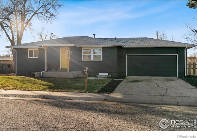 ranch-style home with a garage