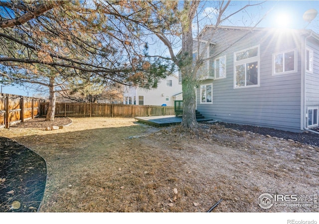 view of yard featuring a fenced backyard