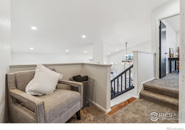 608 Bluegrass Dr, Longmont, CO 80503 - sitting room featuring carpet flooring, a chandelier, recessed lighting, an upstairs landing, and baseboards
