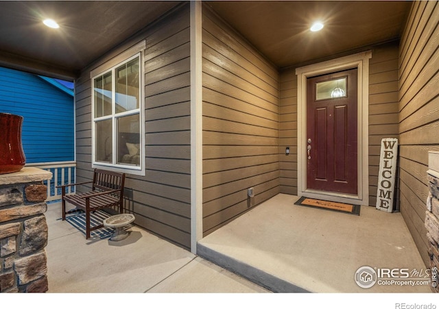 entrance to property with a porch