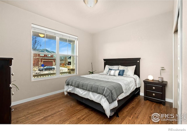 bedroom featuring hardwood / wood-style flooring