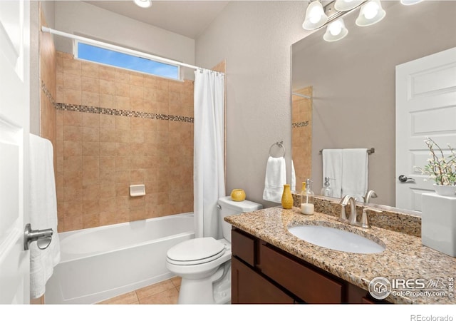 full bathroom featuring tile patterned floors, shower / bath combination with curtain, toilet, and vanity