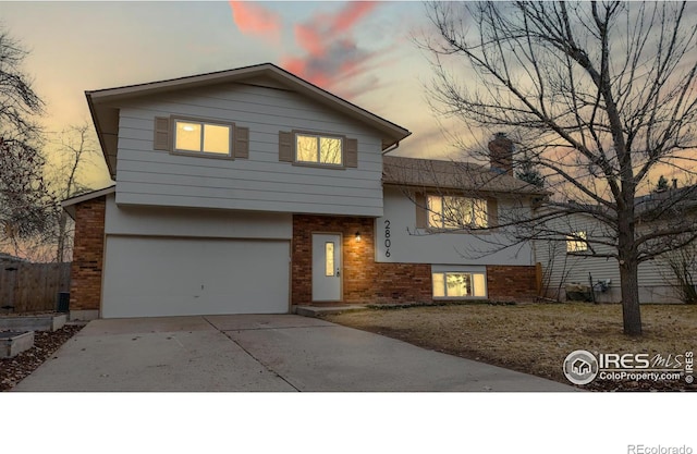 split level home with a garage