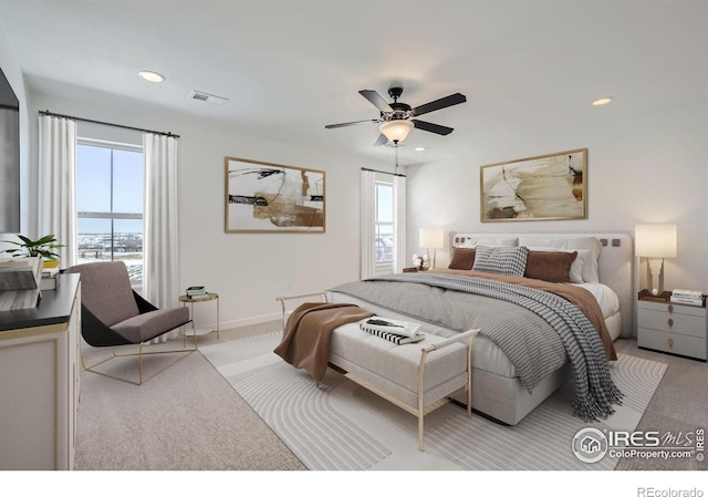 bedroom with baseboards, visible vents, ceiling fan, carpet floors, and recessed lighting