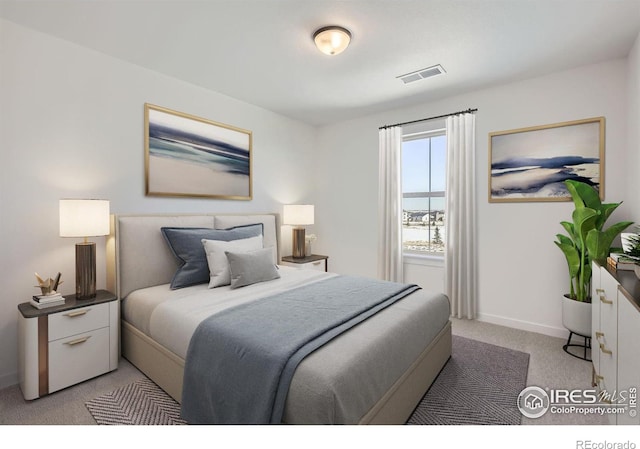 bedroom featuring light carpet, visible vents, and baseboards