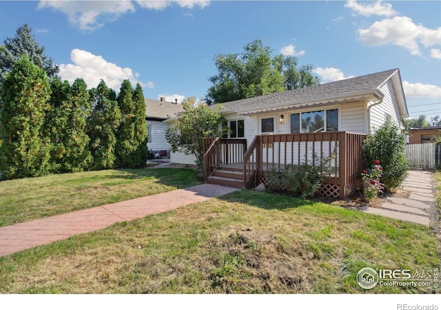 ranch-style house with a front yard