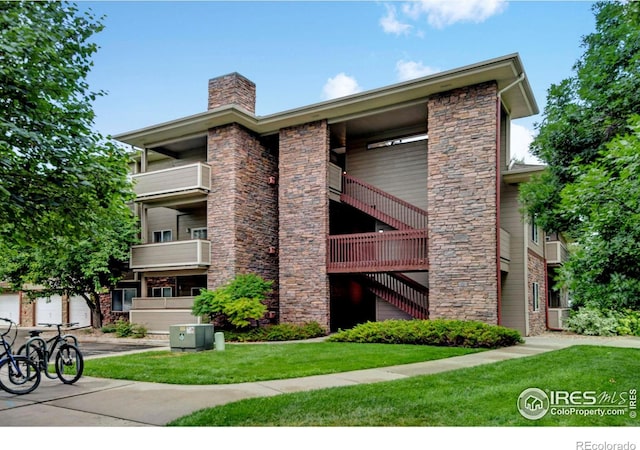 view of property featuring central AC unit