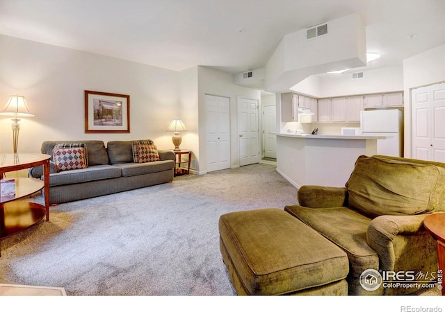 living room with light colored carpet