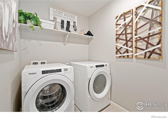 laundry area featuring washer and clothes dryer