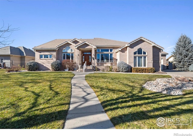 view of front of home with a front yard