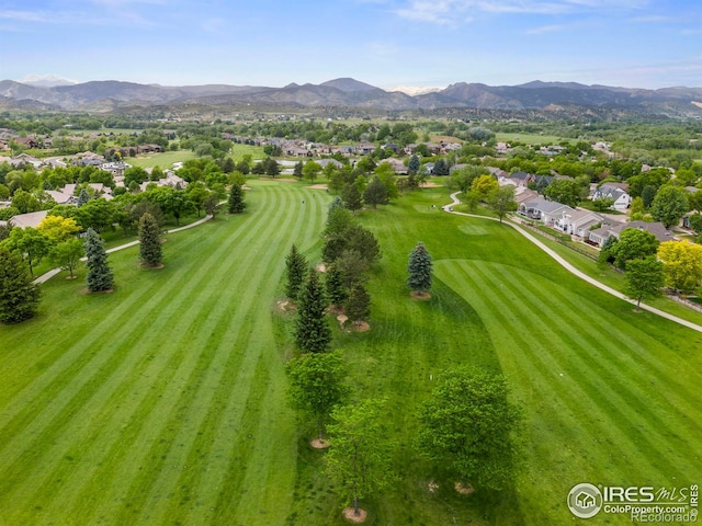 birds eye view of property featuring a mountain view