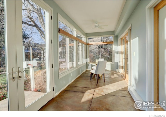 sunroom with ceiling fan and a wealth of natural light