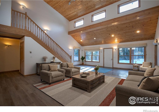 living room featuring wood-type flooring, high vaulted ceiling, and wooden ceiling