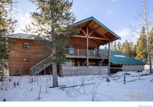 view of snow covered property