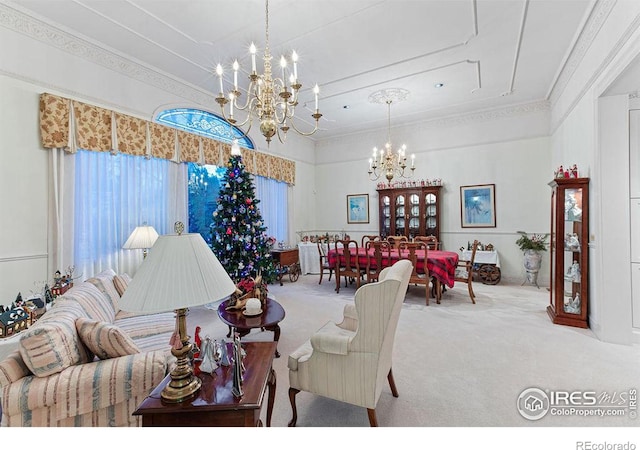 living room featuring a notable chandelier, carpet floors, and crown molding