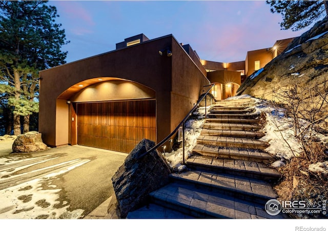 view of front of property featuring a garage