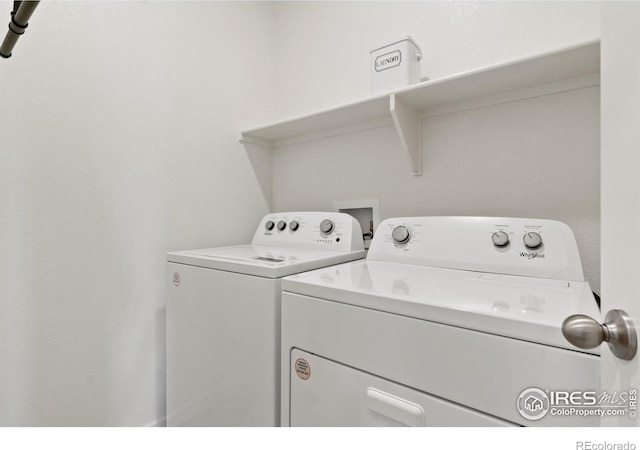 laundry area with washer and clothes dryer