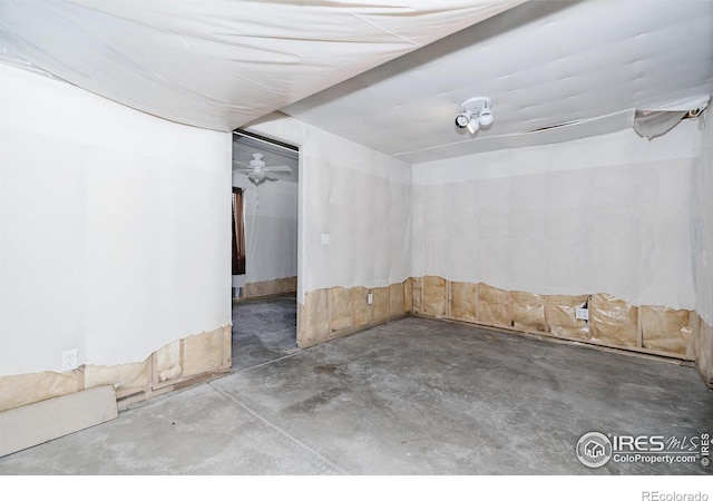 basement with ceiling fan