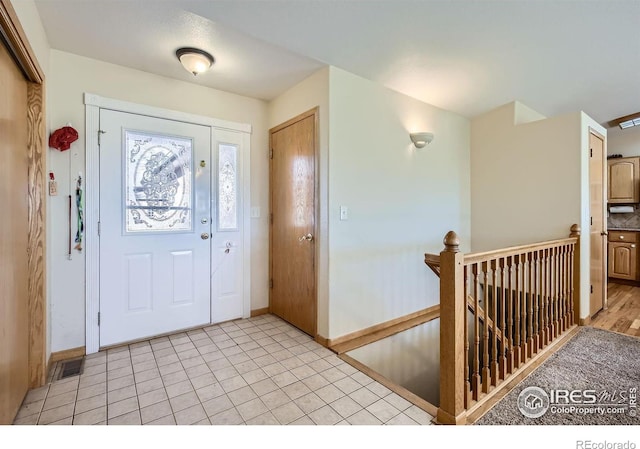 view of tiled entrance foyer