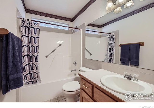 full bathroom with tile patterned flooring, backsplash, vanity, shower / bath combination with curtain, and toilet