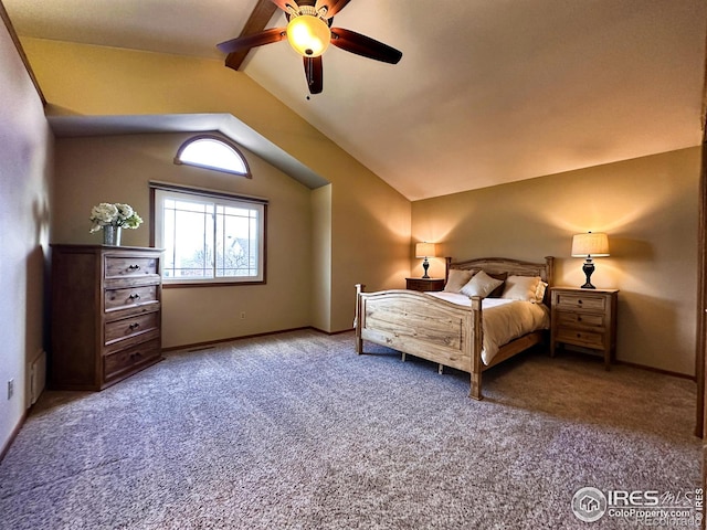 bedroom featuring carpet floors, vaulted ceiling, and ceiling fan