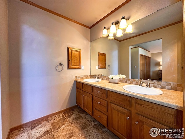 bathroom with vanity and ornamental molding