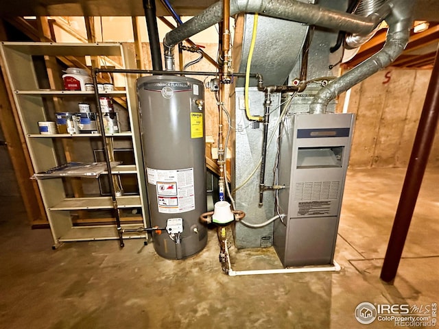 utility room with gas water heater