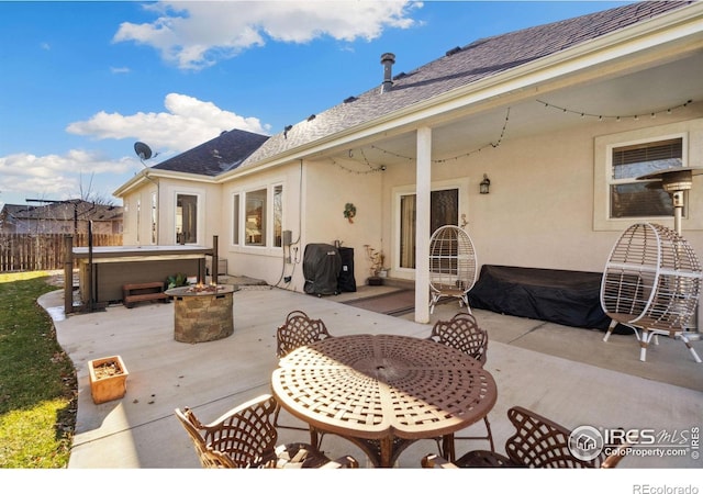 view of patio / terrace featuring a hot tub