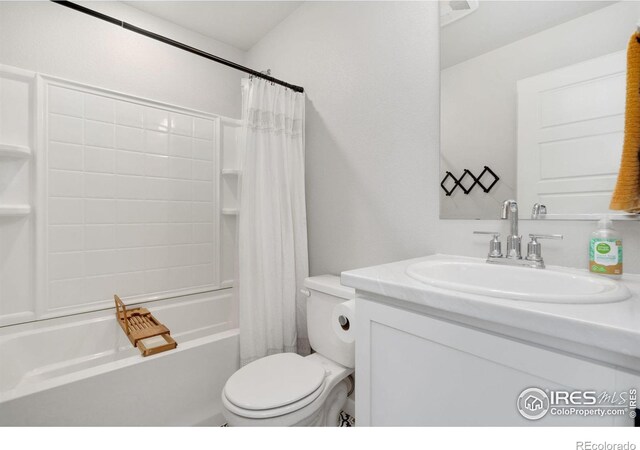 full bathroom featuring vanity, toilet, and shower / bath combo