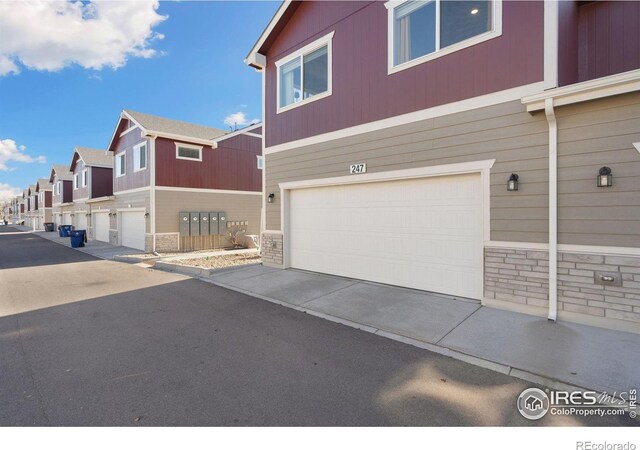 exterior space with a garage