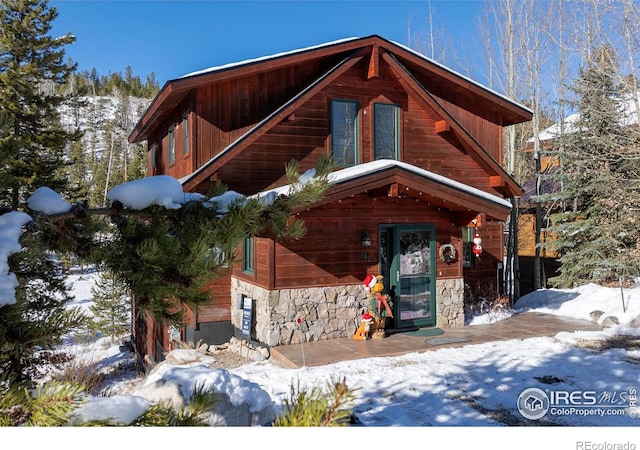 view of log cabin