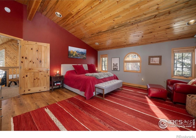 bedroom featuring beamed ceiling, wood ceiling, hardwood / wood-style floors, and high vaulted ceiling