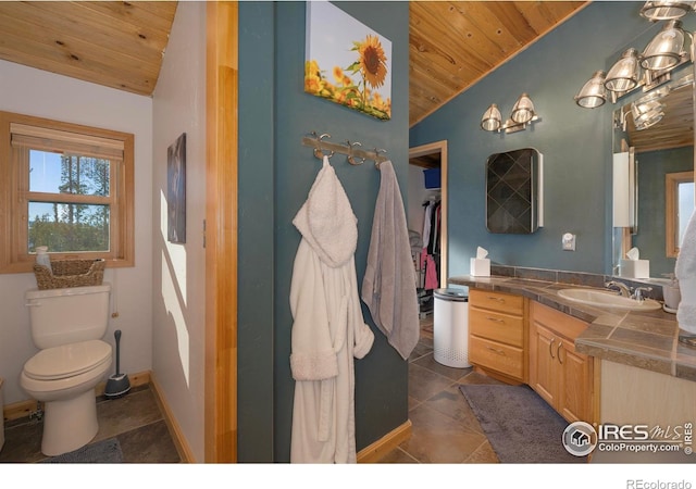 bathroom with vanity, wooden ceiling, vaulted ceiling, and toilet