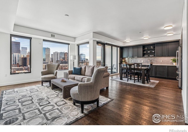 living room featuring dark hardwood / wood-style floors