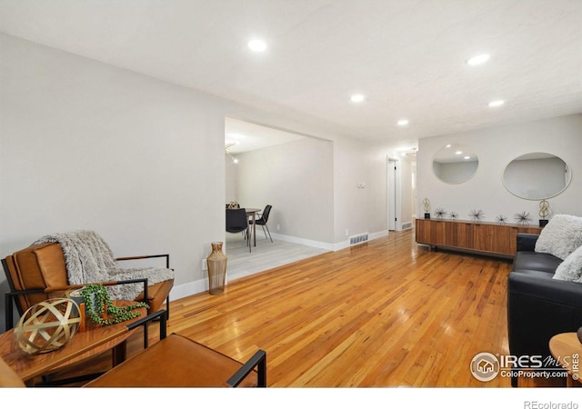 living room with light hardwood / wood-style floors