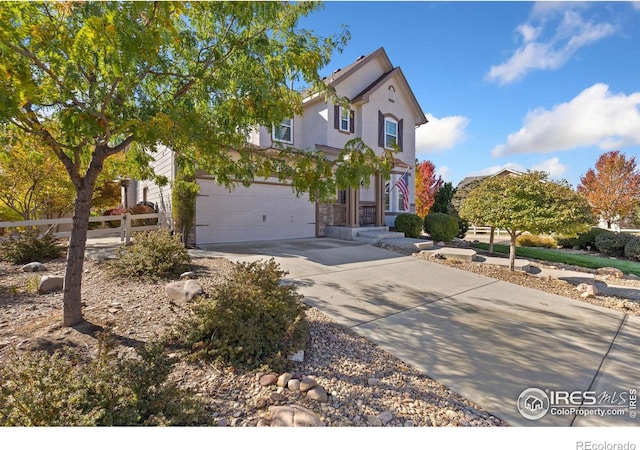 view of front of property with a garage