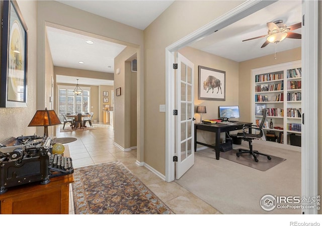 tiled office space with ceiling fan