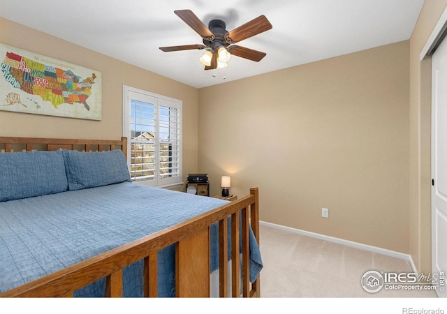 carpeted bedroom featuring ceiling fan