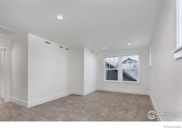 view of carpeted spare room