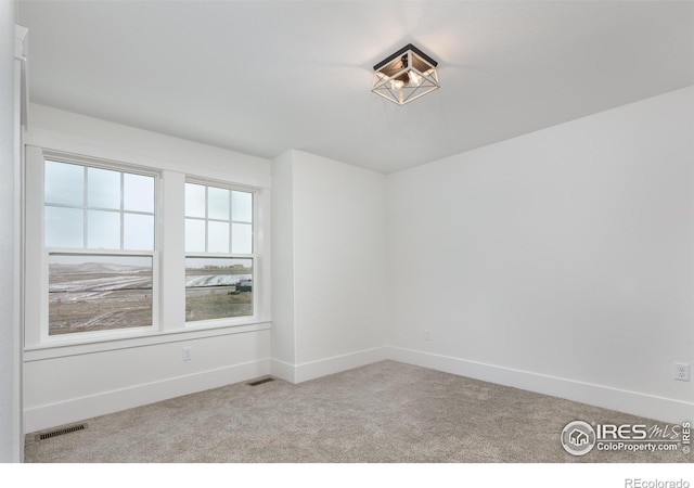 view of carpeted empty room