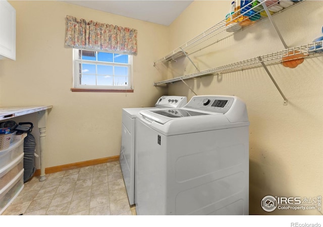 washroom featuring independent washer and dryer