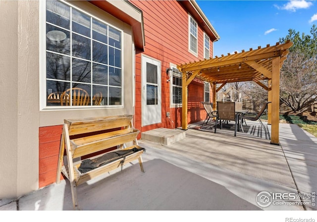 view of patio featuring a pergola