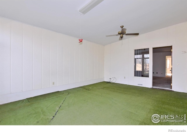 carpeted empty room with ceiling fan