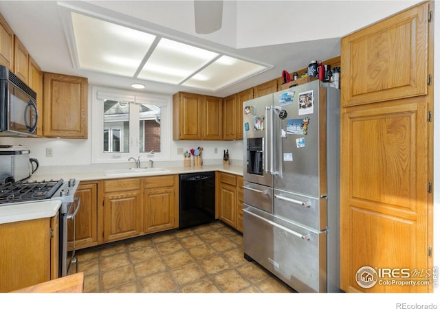 kitchen with sink and black appliances