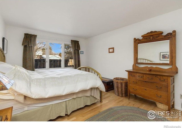 bedroom with light hardwood / wood-style flooring